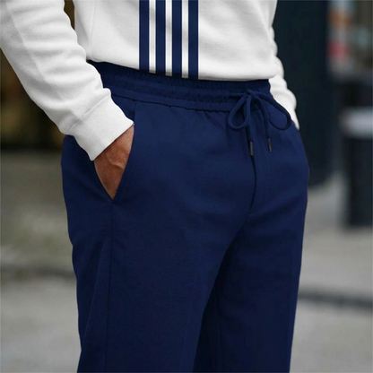 🔥🧵 Men's Graphic Print Pullover & Pants Set – Bold streetwear style. Ultimate comfort for lounging or errands. 🎨👖 Complete look, zero effort. Shop now!