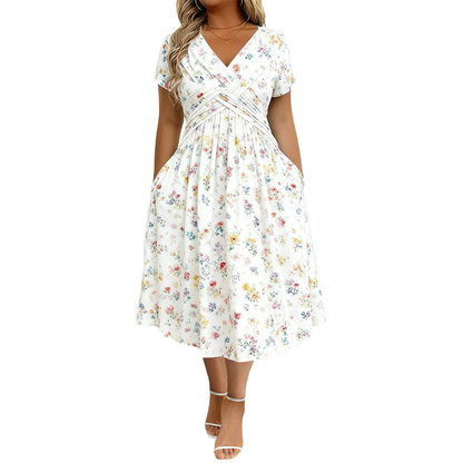 🌸 Floral V-neck dress with a twist at the waist—elegant and casual for any occasion
