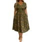 🌸 Floral V-neck dress with a twist at the waist—elegant and casual for any occasion